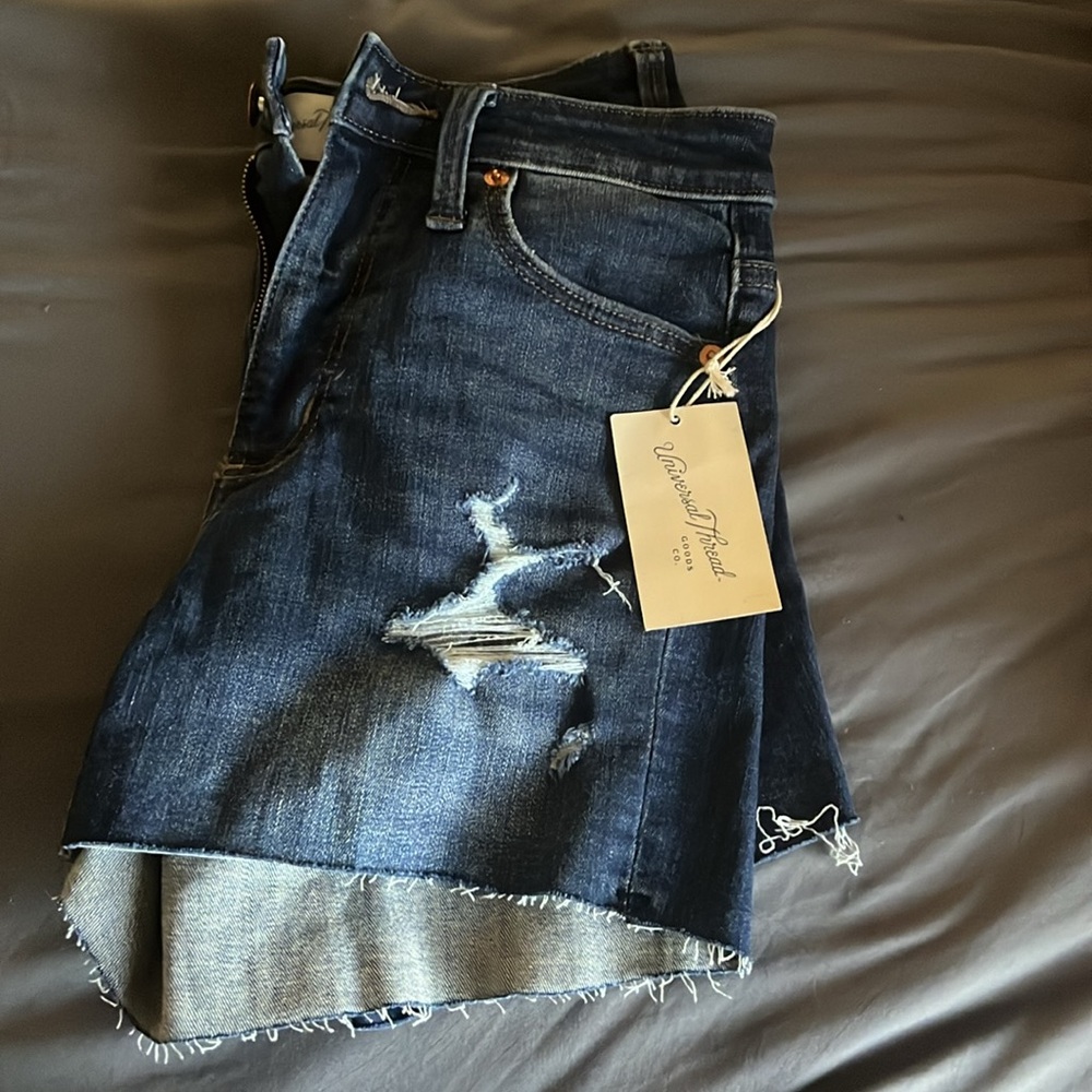 New pair of denim shorts